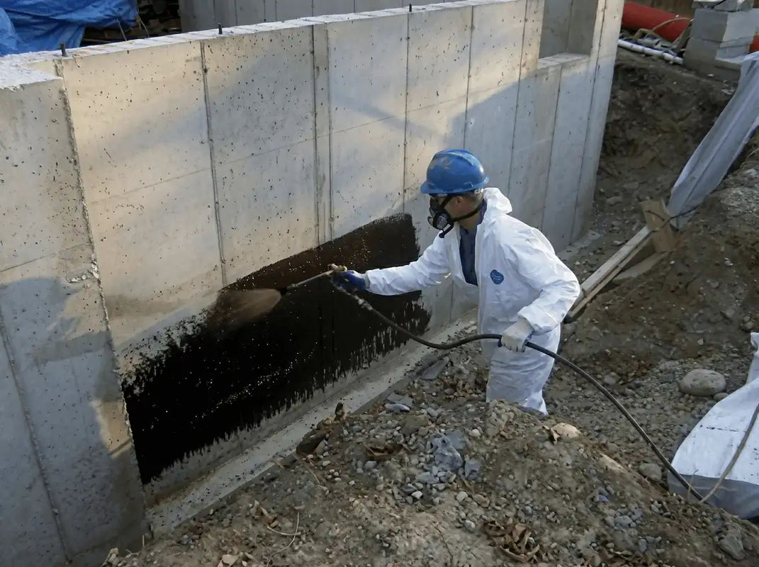 Professional waterproofing the exterior walls of the basement in San Francisco, CA