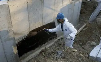 Professional waterproofing the exterior walls of the basement in San Francisco, CA