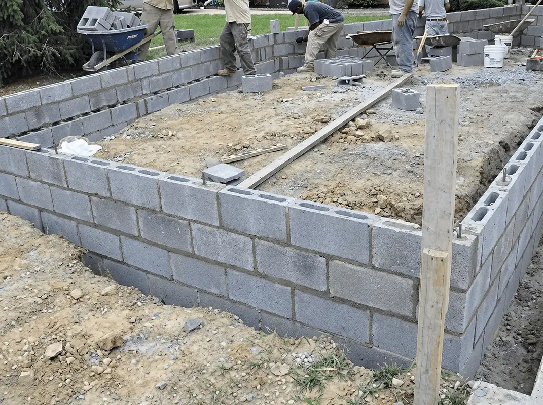 Professionals building a foundation with blocks in San Francisco, CA